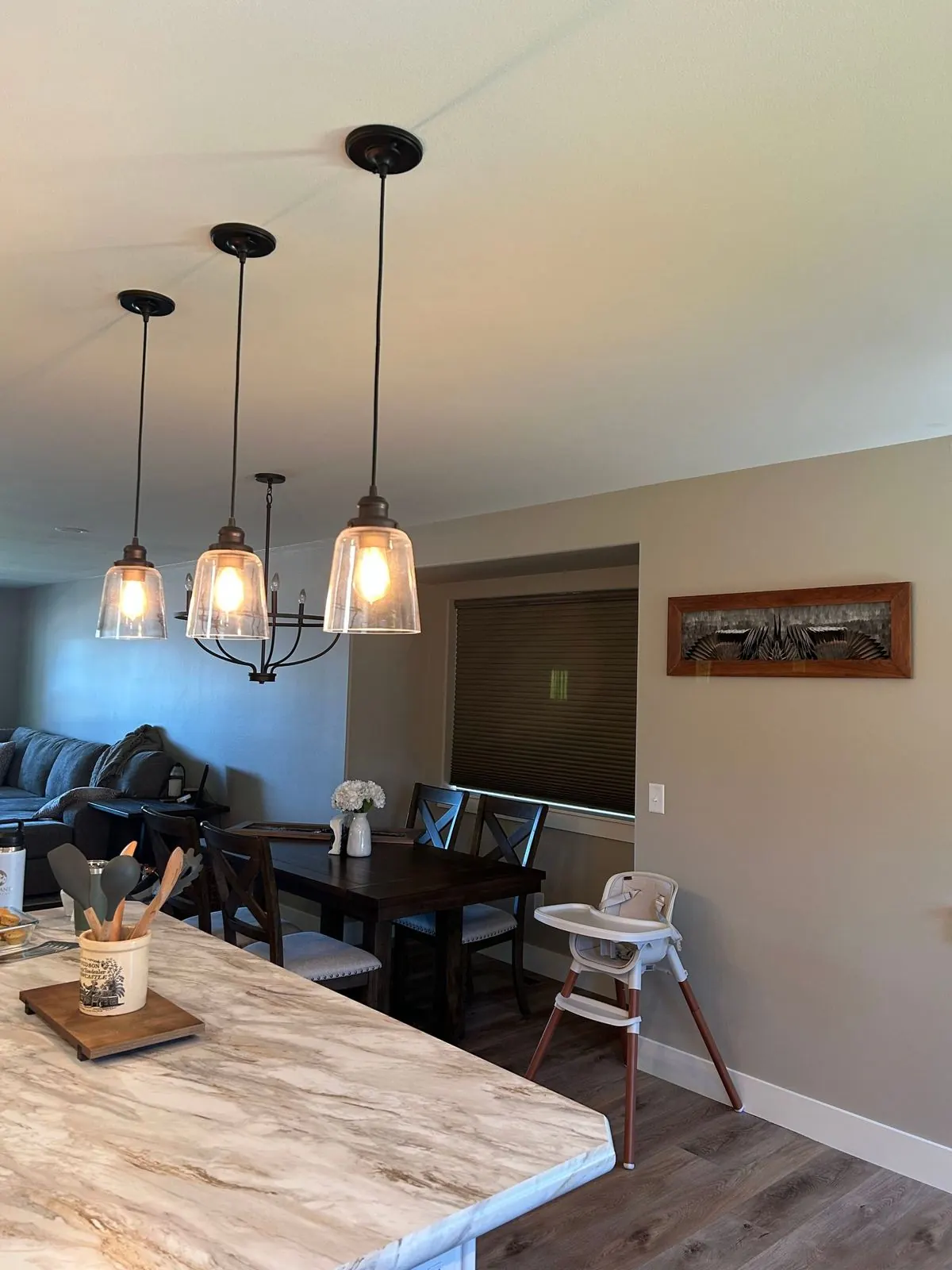 Drake pintail feather board hanging in a kitchen